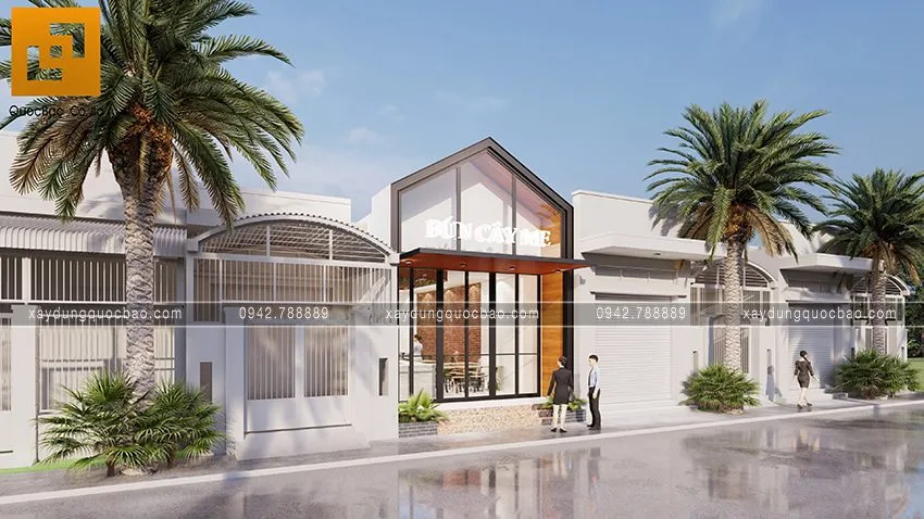 Những chậu cây xanh trang trí hai bên lối đi dẫn vào trong quán