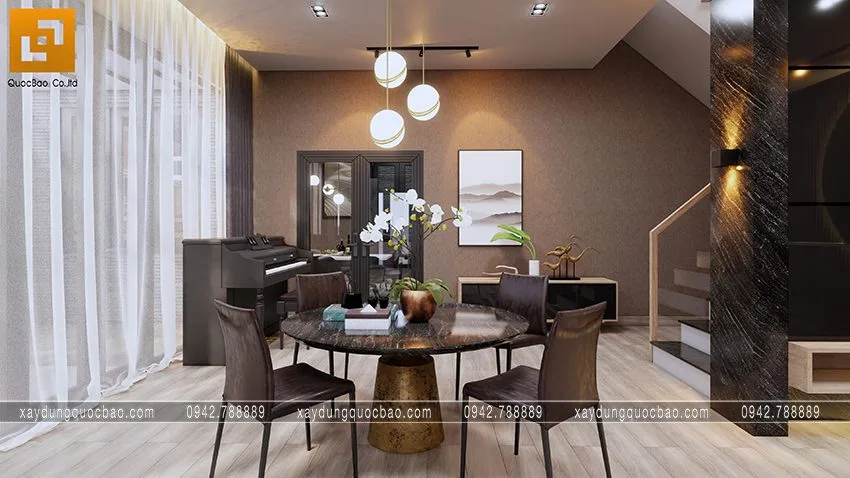 Biệt thự phố đẹp hiện đại giao thoa phong cách kiến trúc Á Âu 16 Góc không gian phụ bố trí 1 bộ bàn trà, cây đàn piano kê ở góc phòng gợi đến hương vị hoài cổ cho phòng khách