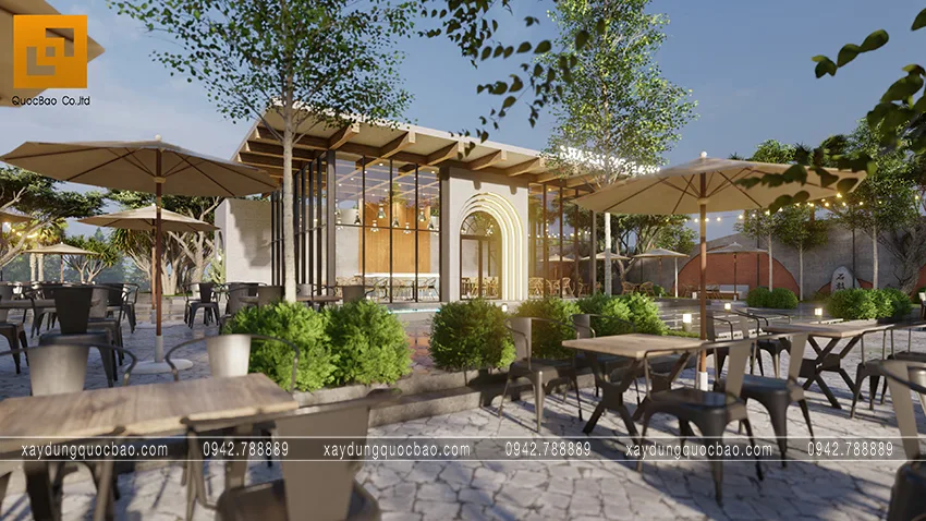 Khuôn viên quán cà phê được bố trí rộng rãi với  nhiều tiểu cảnh cây xanh