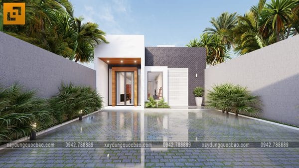 Thiết kế mặt tiền ấn tượng và đẹp mắt. Khoảng sân rộng được lát đá và bố trí nhiều mảng xanh mát.