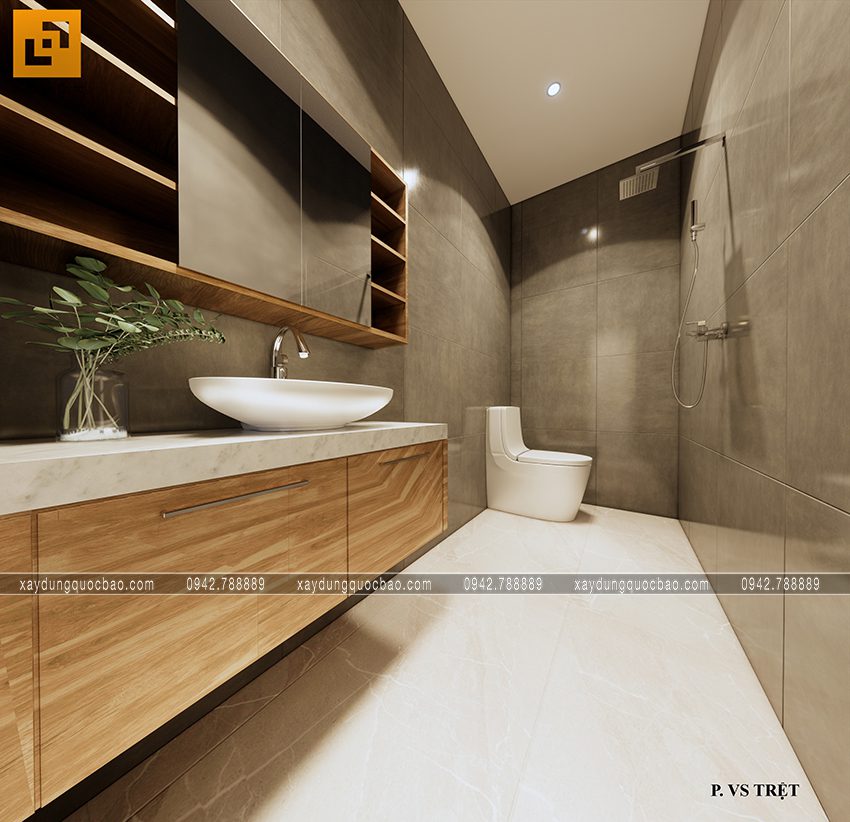 Nhà tắm và wc được bố trí chung không gian với gạch ốp tường cỡ lớn tạo không gian rộng và thoáng